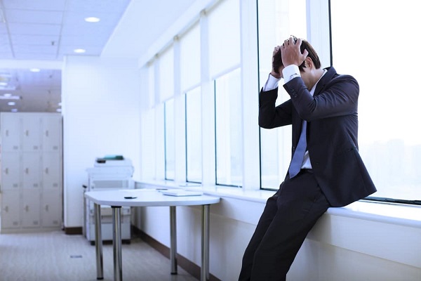 homme d'affaire déprimé